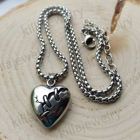 Broken/ mended heart necklace