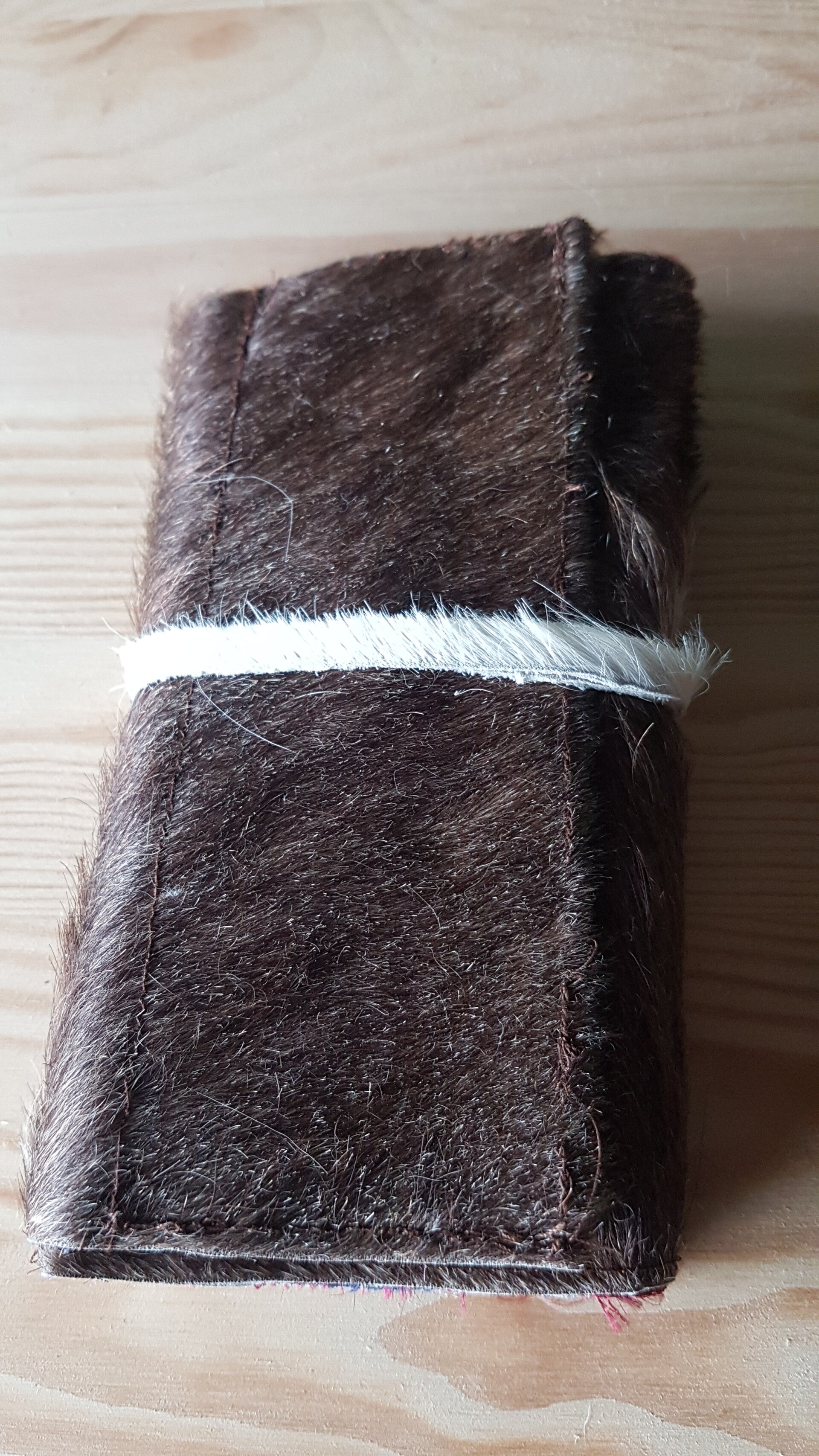 Porte monnaie en peau et cuir