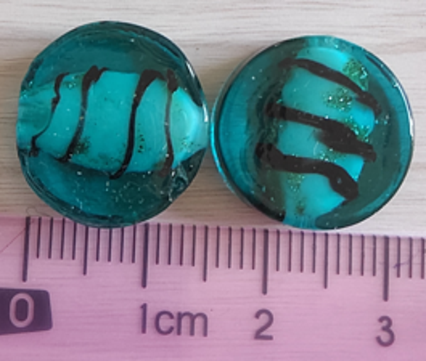 Sphère plate / bleu vert et filament noir