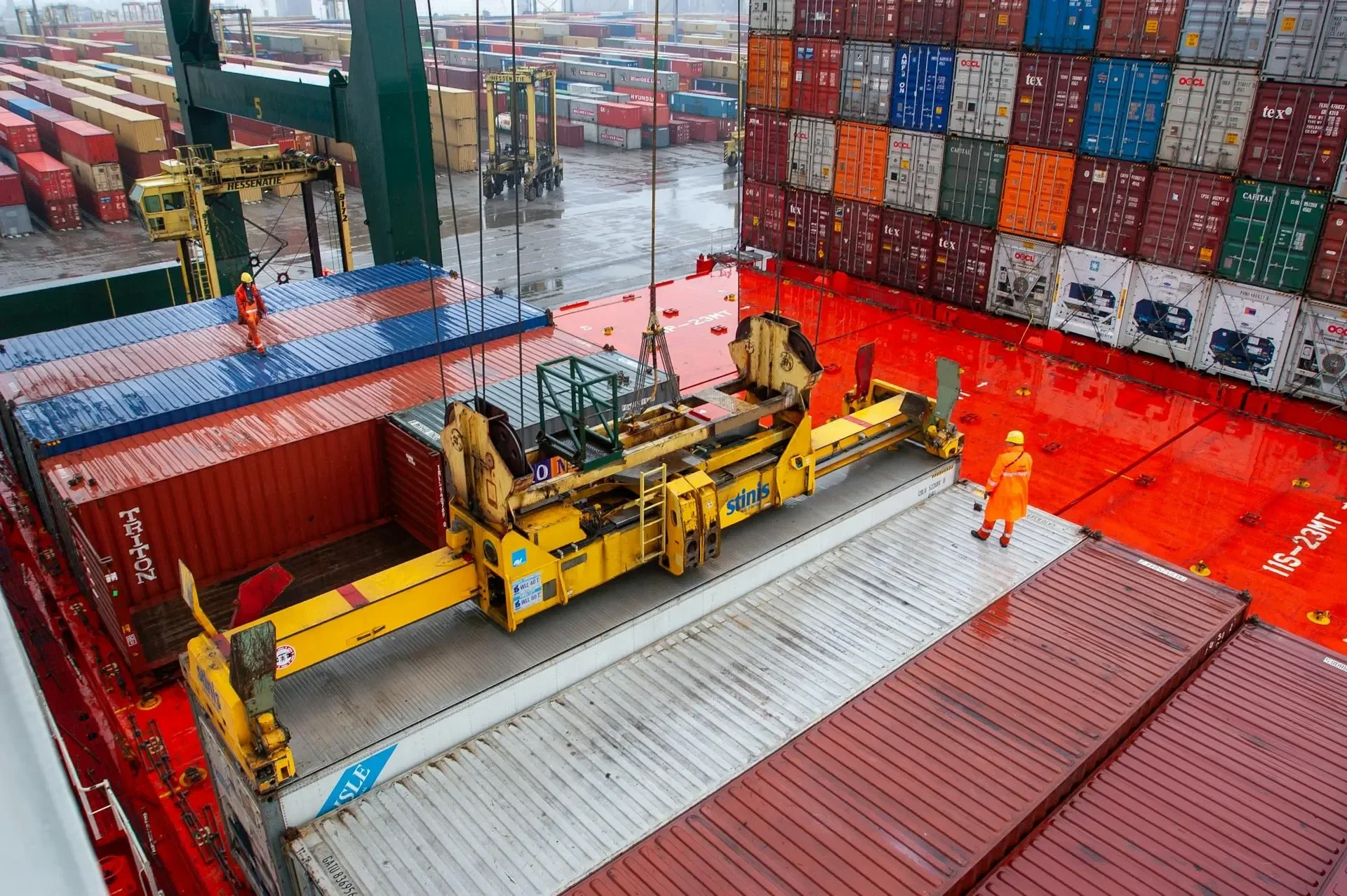 Cold chain logistics for food export — refrigerated containers being loaded at port for international temperature-controlled shipping