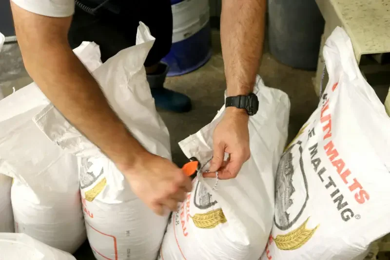 Food quality inspector verifying export products before shipment