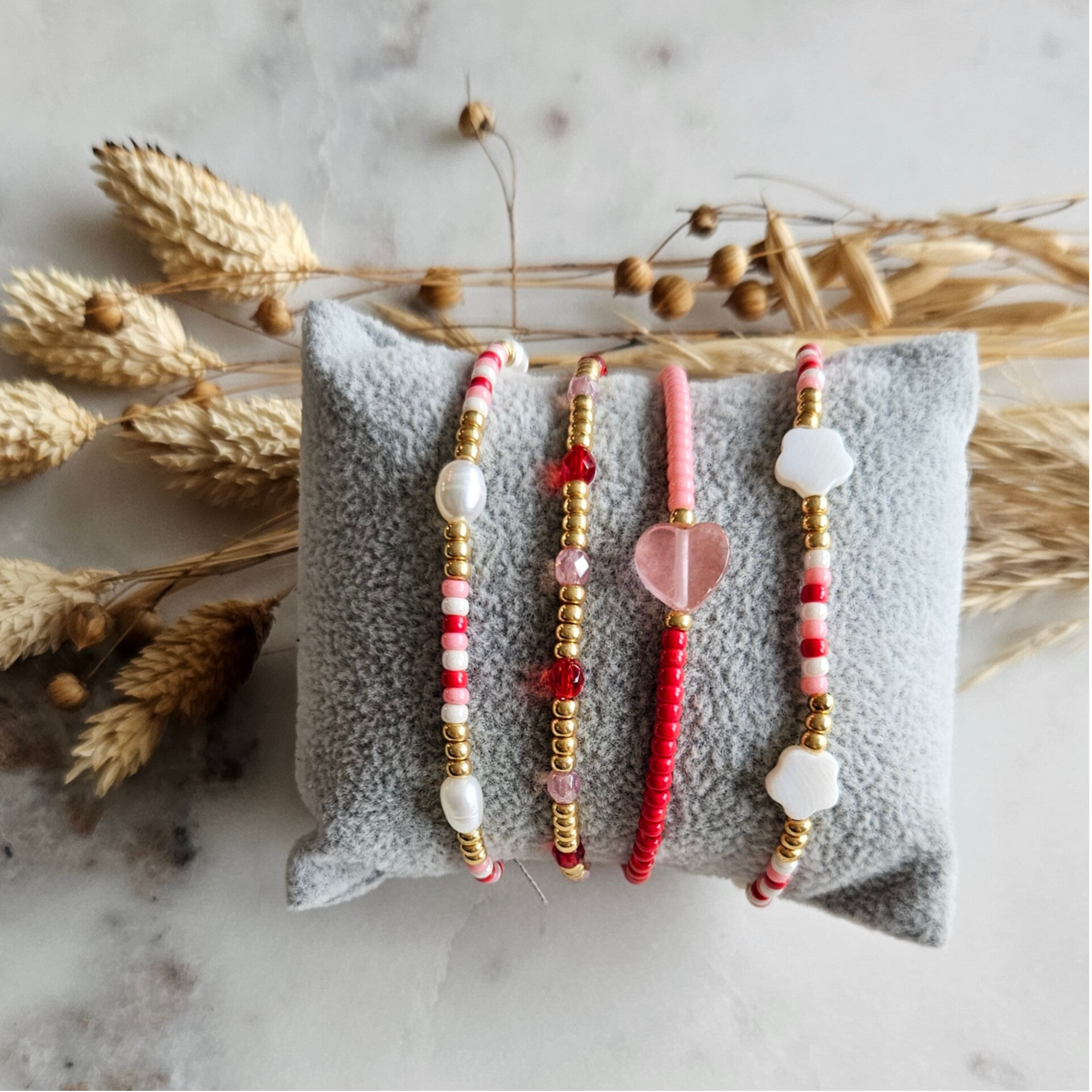 Armbanden set op elastiek (4 armbandjes) - Roze/Goud mix
