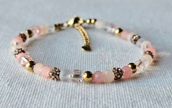 Beads by DEB handgemaakte armband gouden stainless steel, warm roze