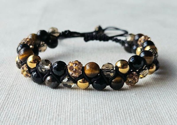 Beads by DEB handgevlochten armband met edelstenen- tigereye, glitter.