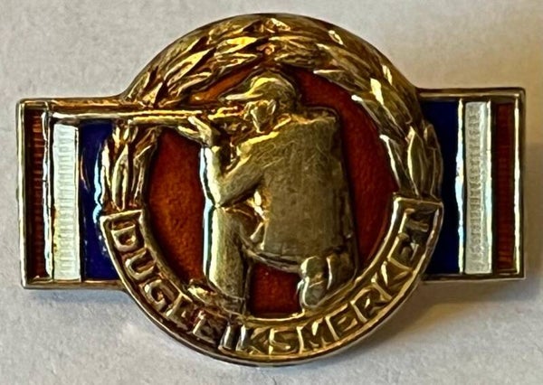 Dugleiksmerket gull - RØD bakgrunn
