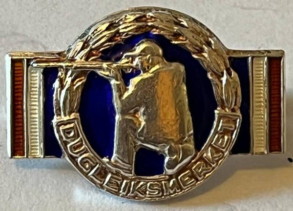 Dugleiksmerket sølv - BLÅ bakgrunn
