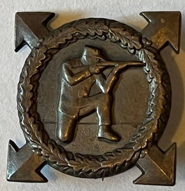 Dugleiksmerket - eldre type i bronse