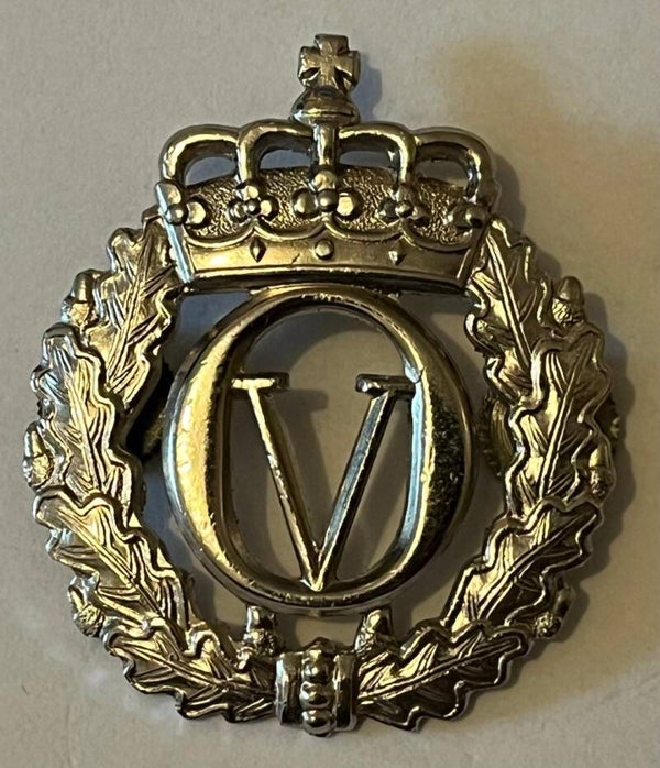 Olav V luemerke Beret forsølvet