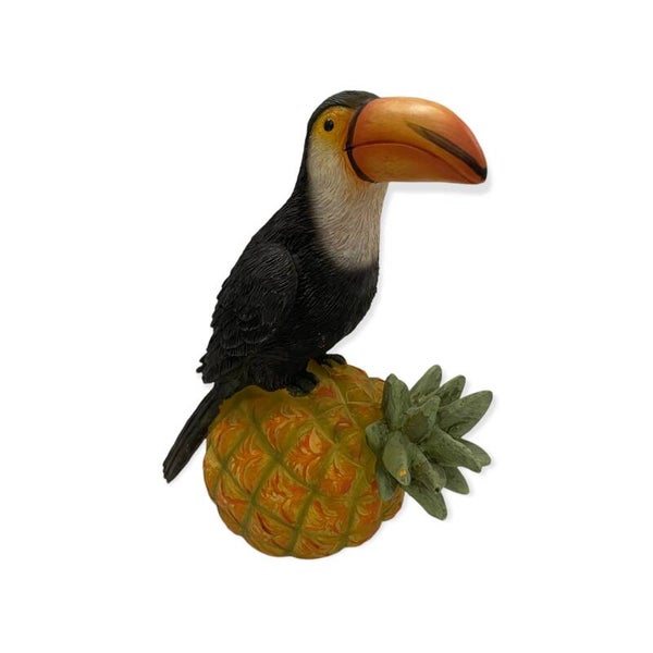 Beeld toekan op ananas zwart