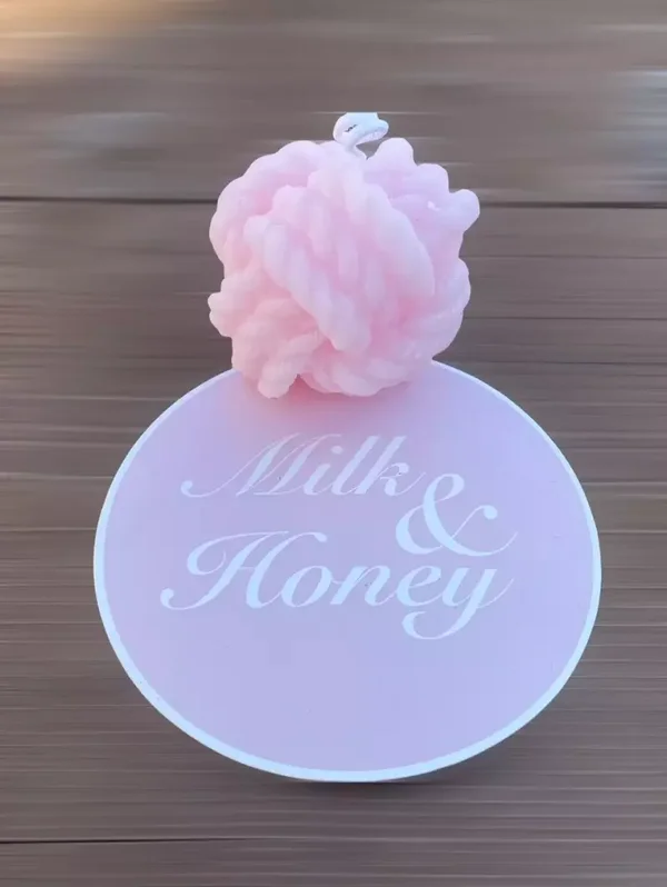 Kaars in de vorm van een bolletje wol roze / knoopkaars roze
