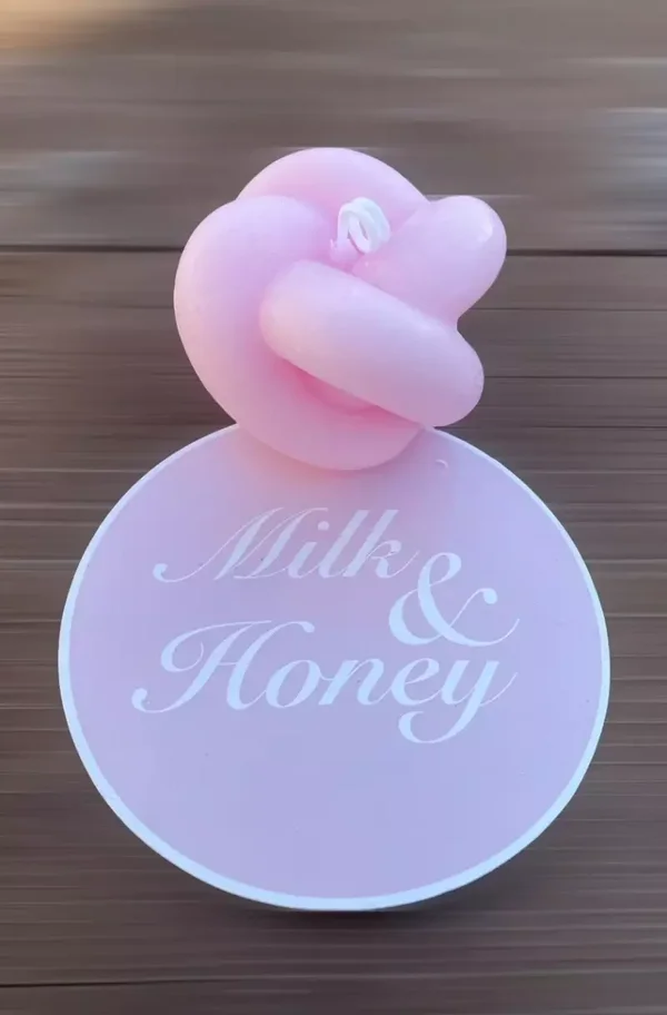 Kaars in de vorm van een knoop roze / knoopkaars roze