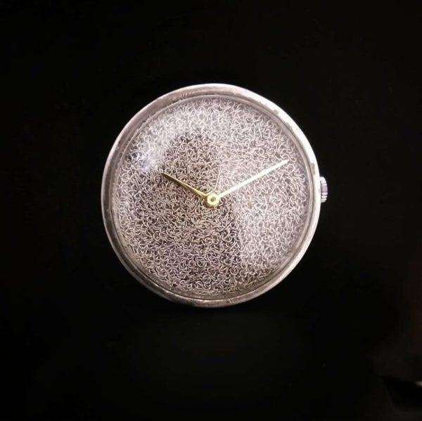Orologio in Trama d'argento