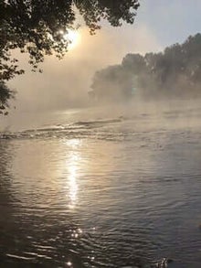 brume au dessus de la Garonne avec soleil derrière la brume