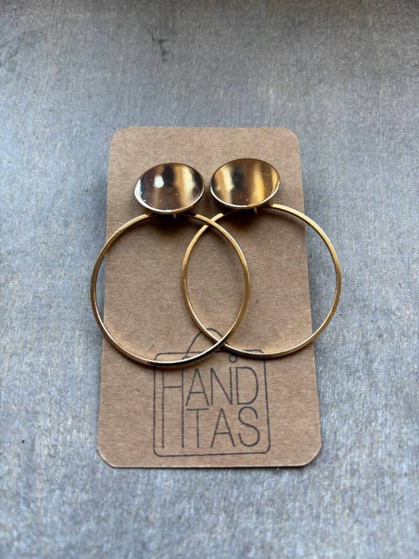 Goudkleurige steker met goudkleurige cirkel