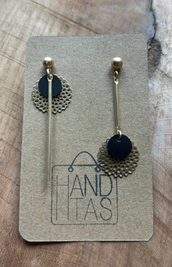 Goudkleurige steker met cirkels en staafje