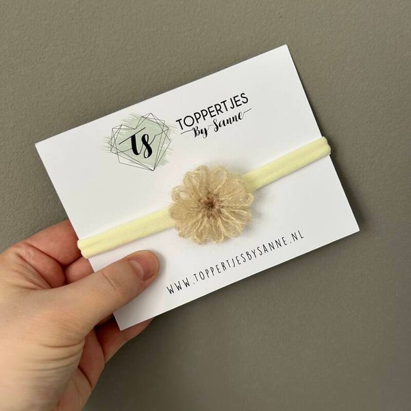 Haarbandje bloem beige