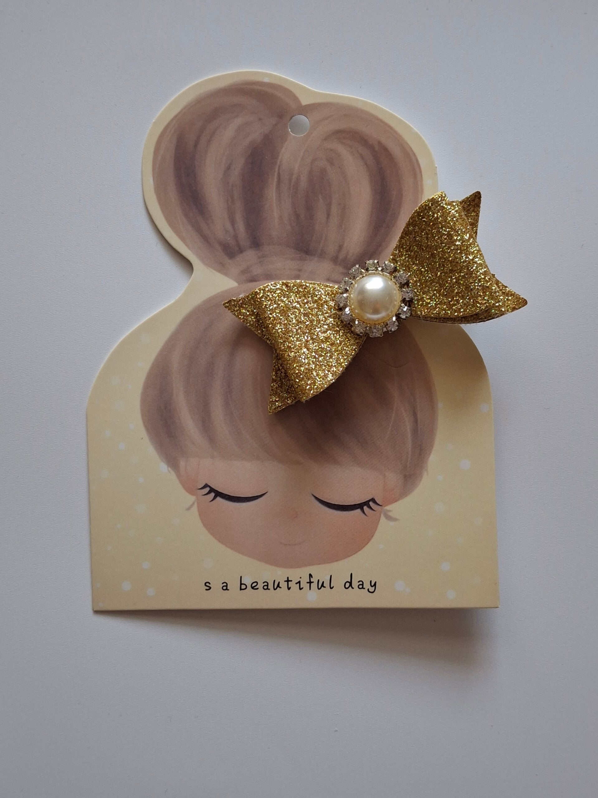 Knijpspeld  ' Glitter strik met parels '