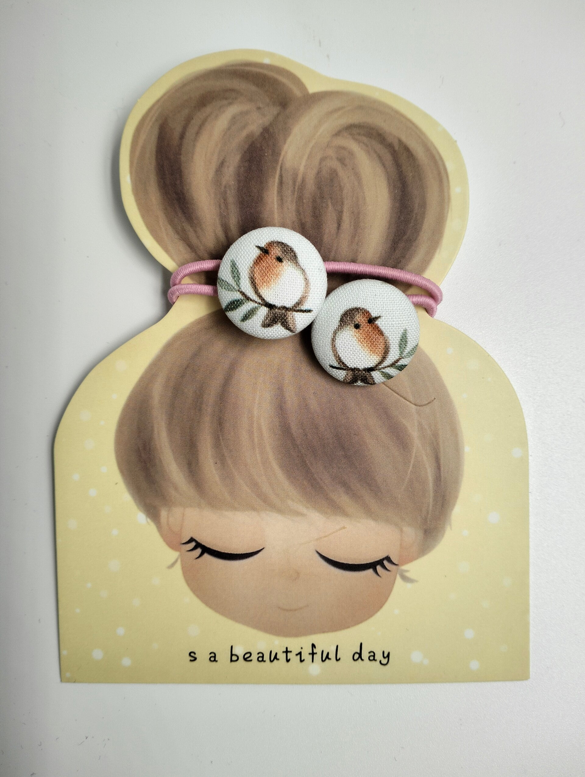 Haar elastiekjes 'vogeltjes