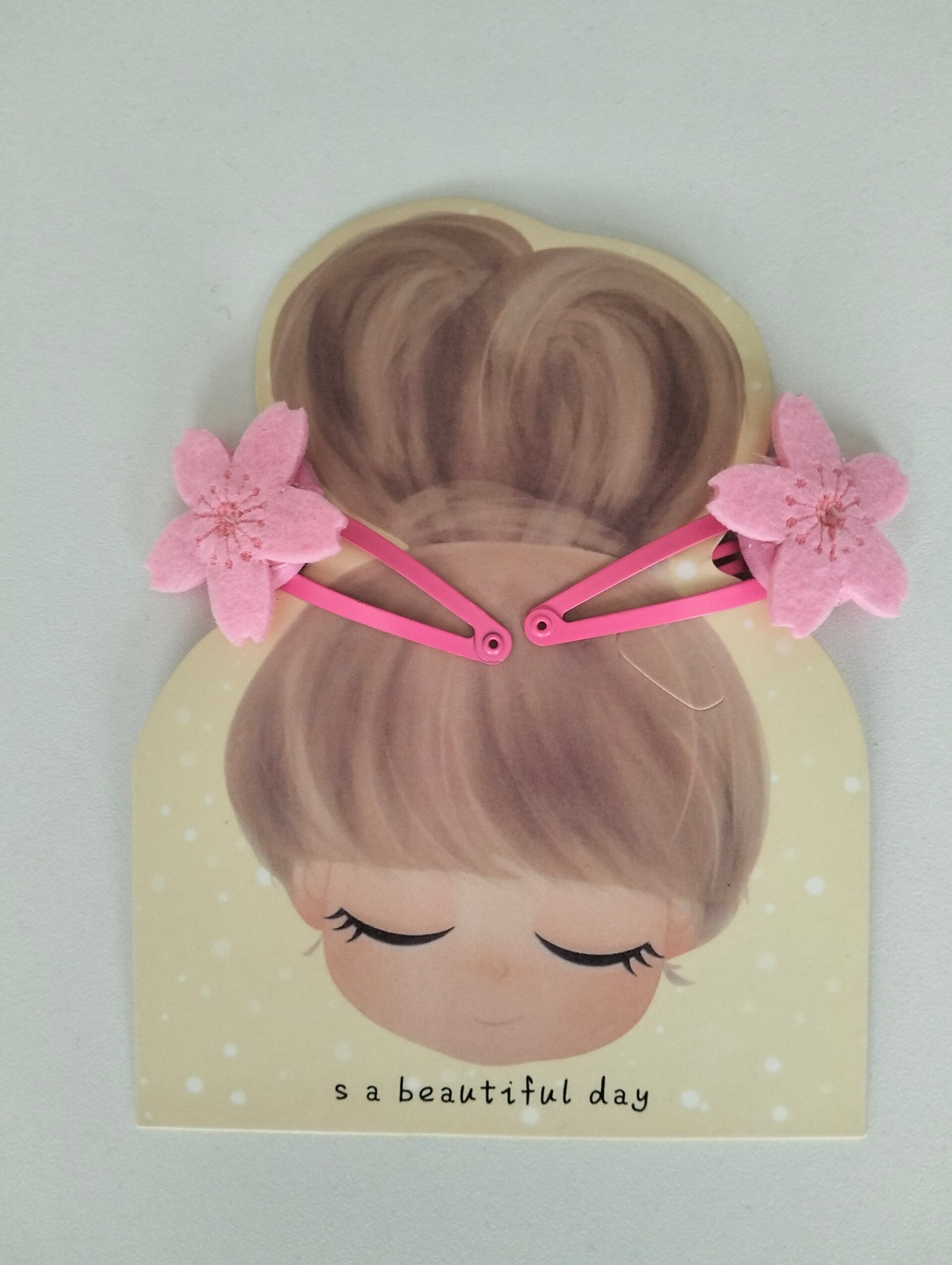 Haar speldjes 'bloemetjes roze'