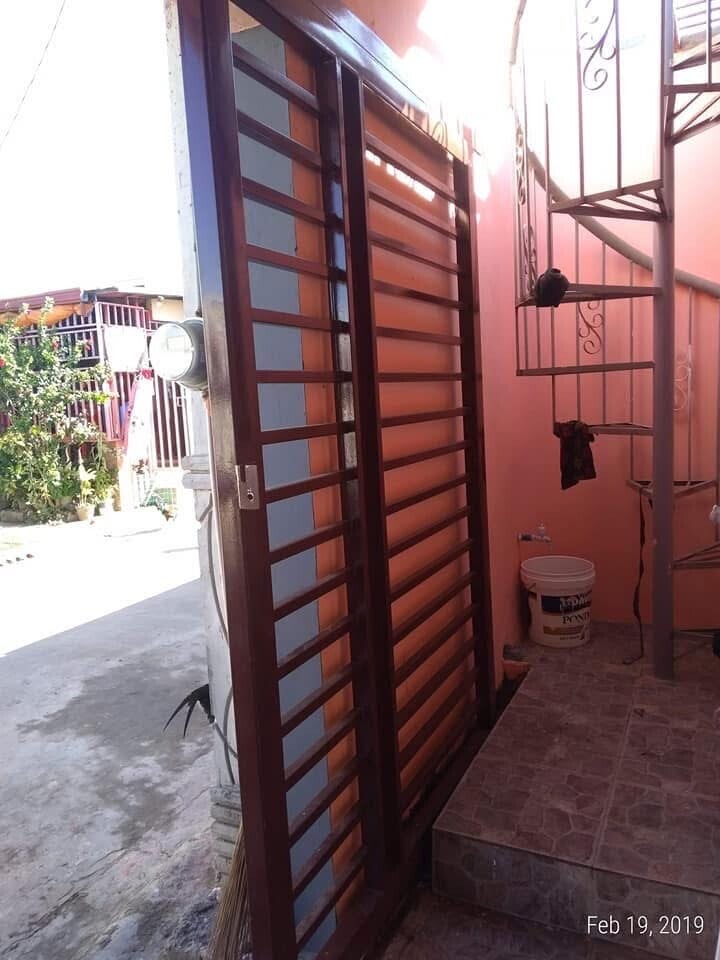 Sliding Gate and Spiral Stair