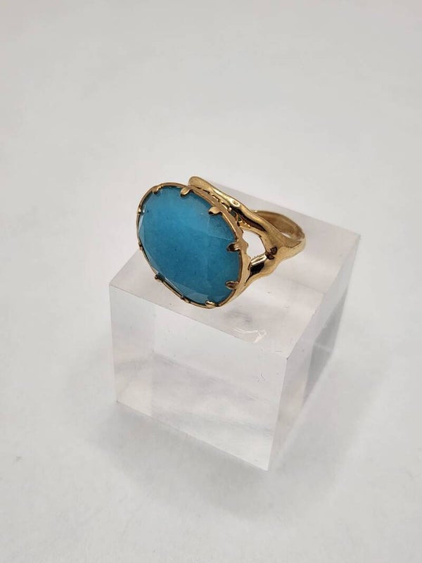 Anillo piedra turquesa facetada.