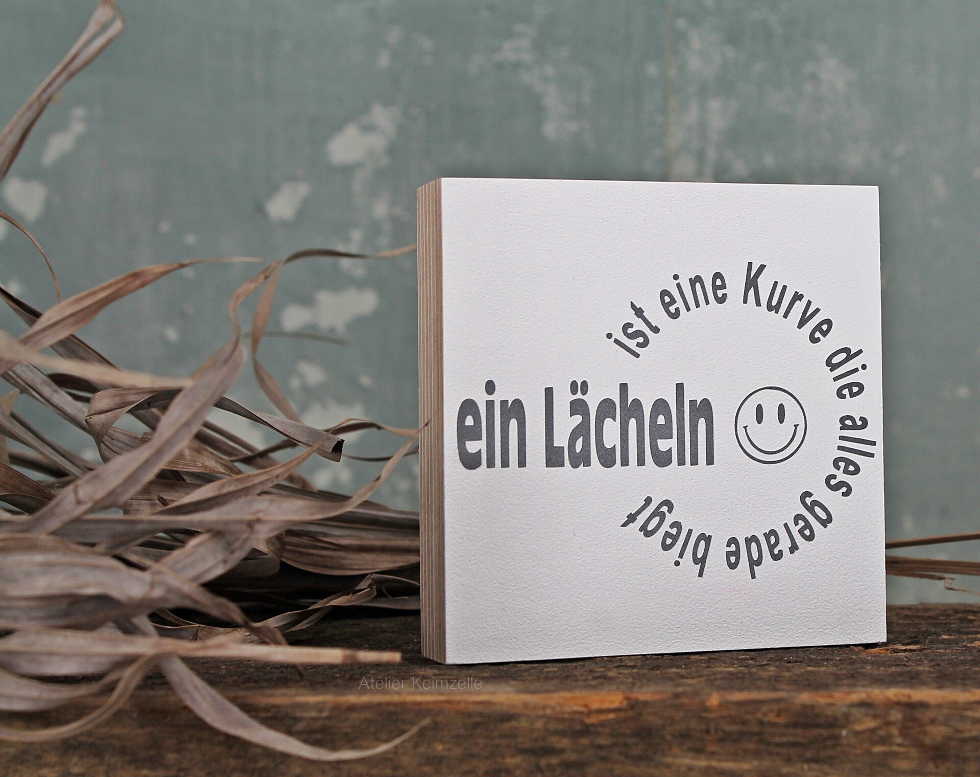 Holzschild mit Spruch, Lächeln, 10x10x2cm