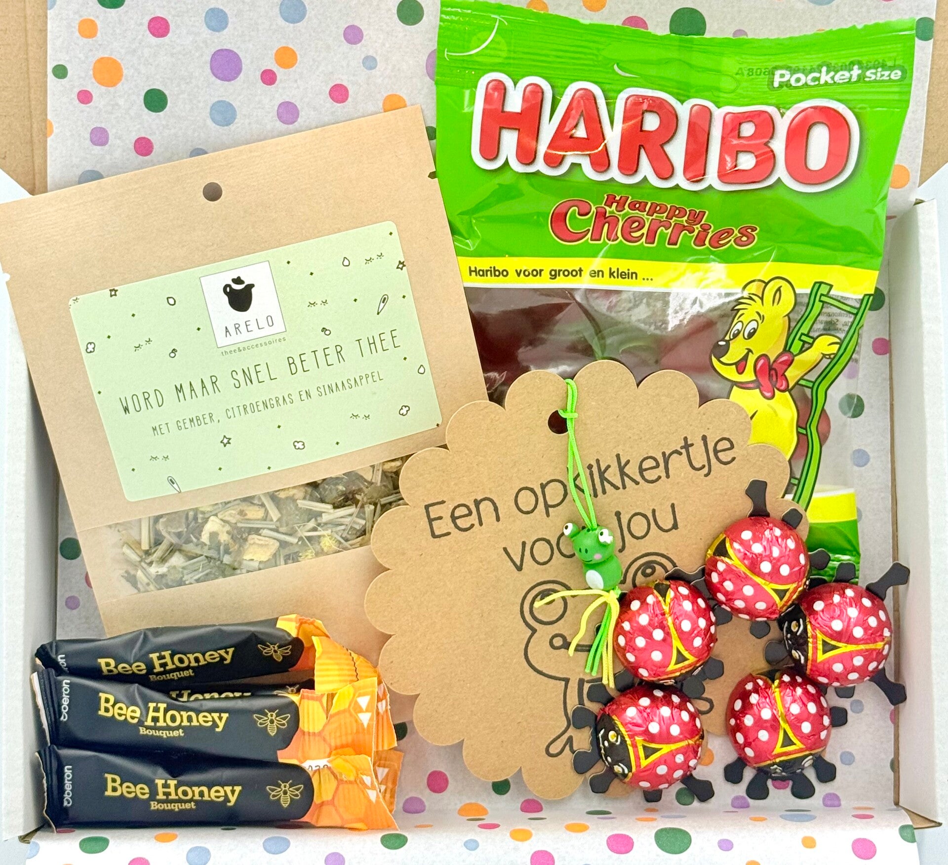 Postkadootje Blijmaker | Haribo kersjes | Word maar snel beter thee in zakje | Opkikkergelukje | Chocolade lieveheersbeestjes | Honing | Kaartje naar keuze