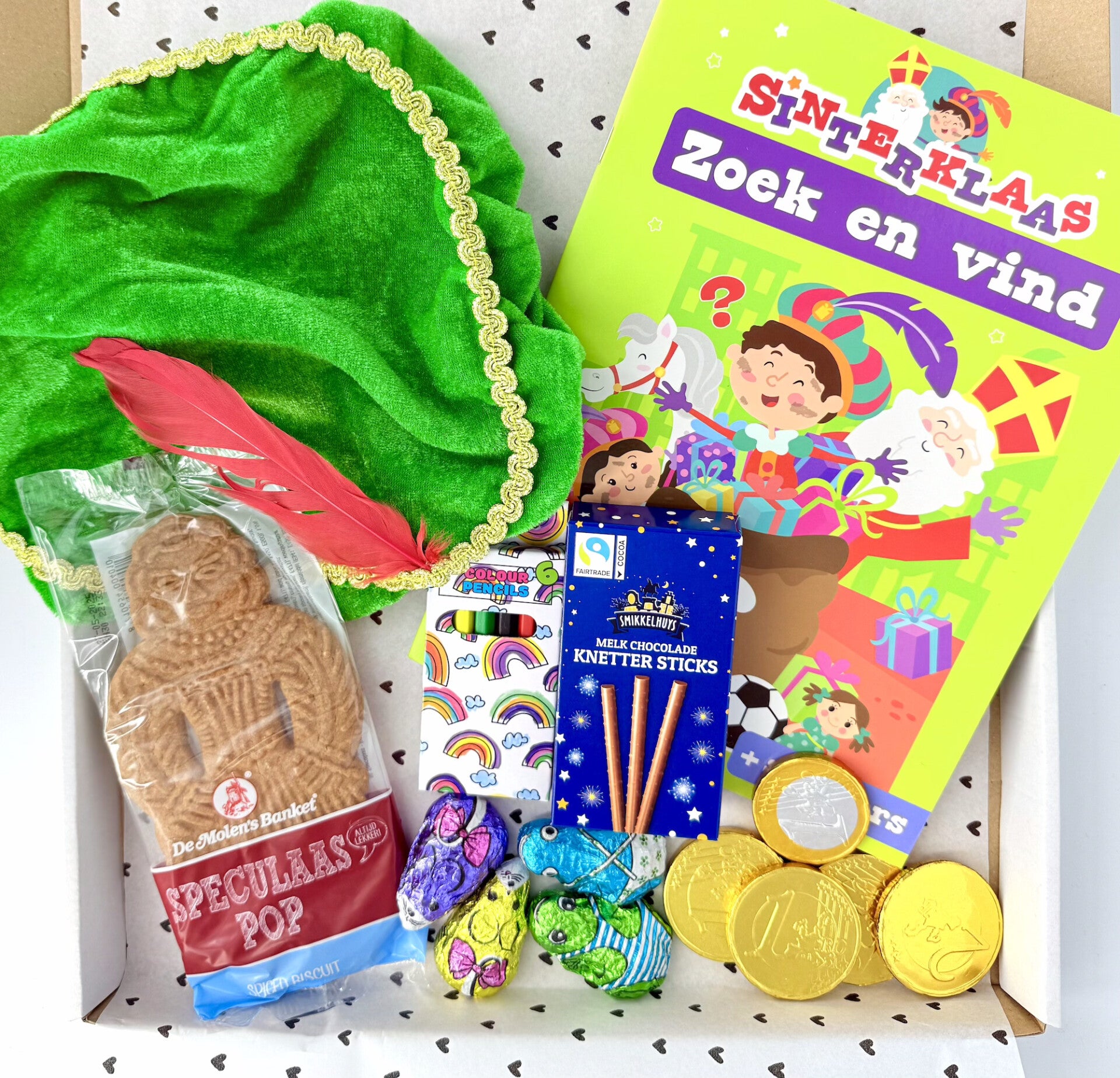 Sinterklaas | Pietenmuts | Zoek en vind boek | Knetter sticks | Chocolademunten | Potloden | Kikkers en muizen | Speculaaspop | Kaartje naar keuze