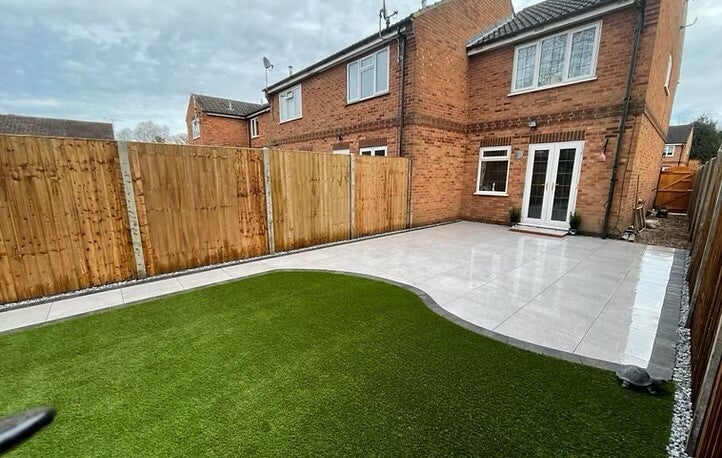  Artificial grass installation and modern patio paving in Tutshill by Heritage trees & Landscapes in Bristol