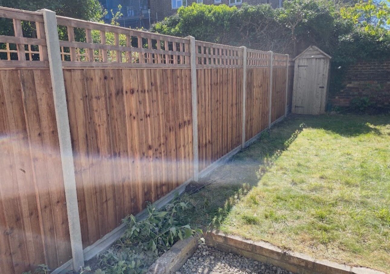 Timber fence panels with trellis toppers and concrete posts installed in Chepstow⁠
