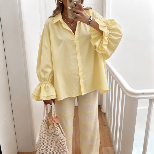 Oversized blouse ruffle mouw
