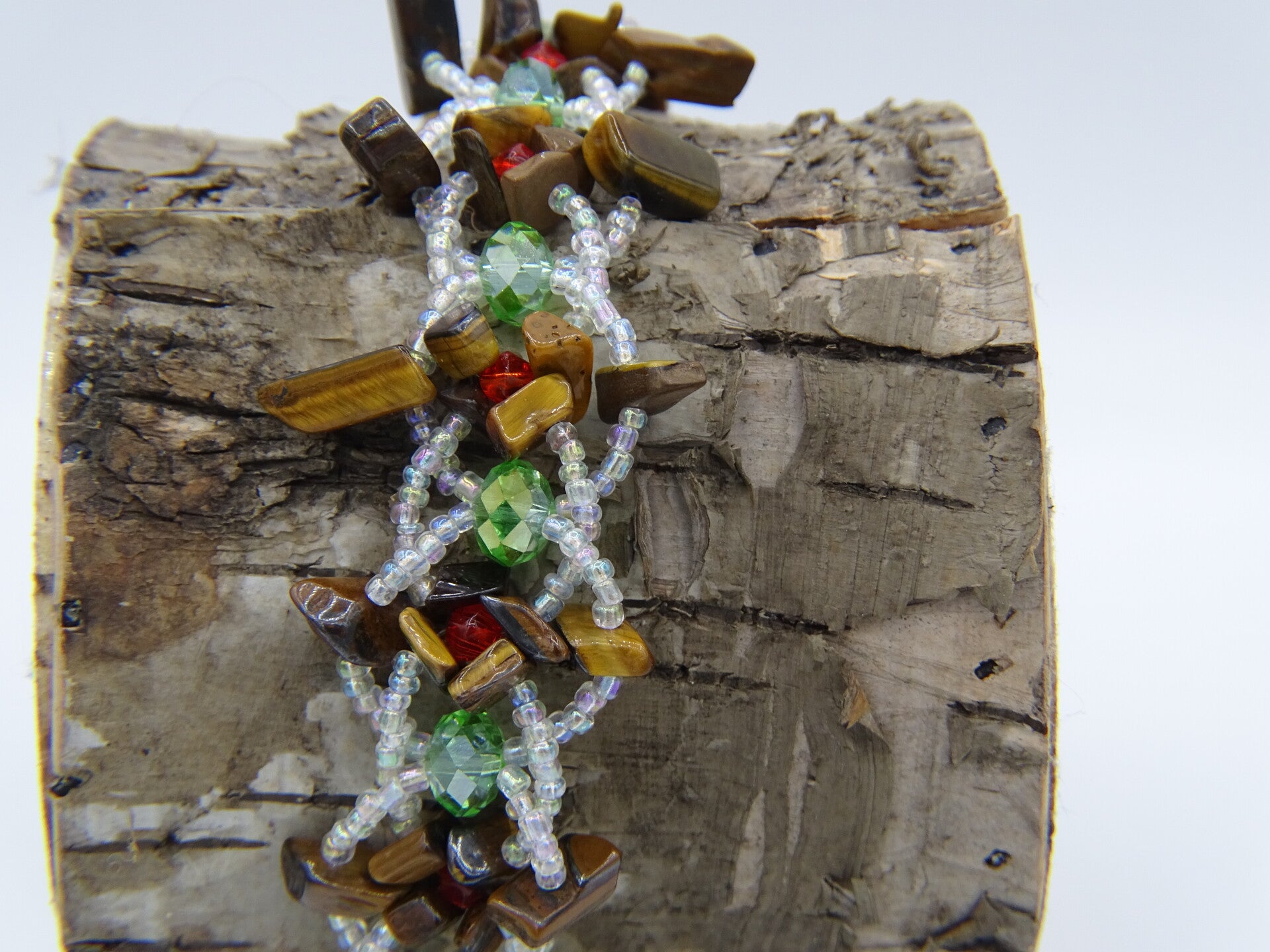 Groen/bruine glaskralen armband