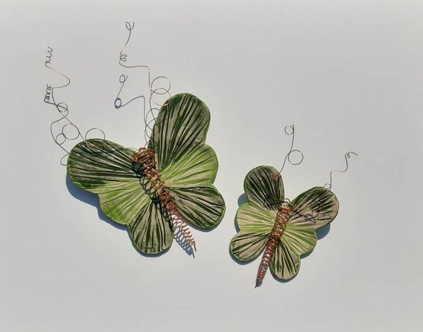 Vlinder Rawa, groen reliëf golf