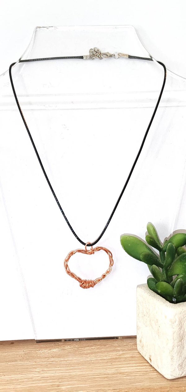 Pendentif coeur tressé