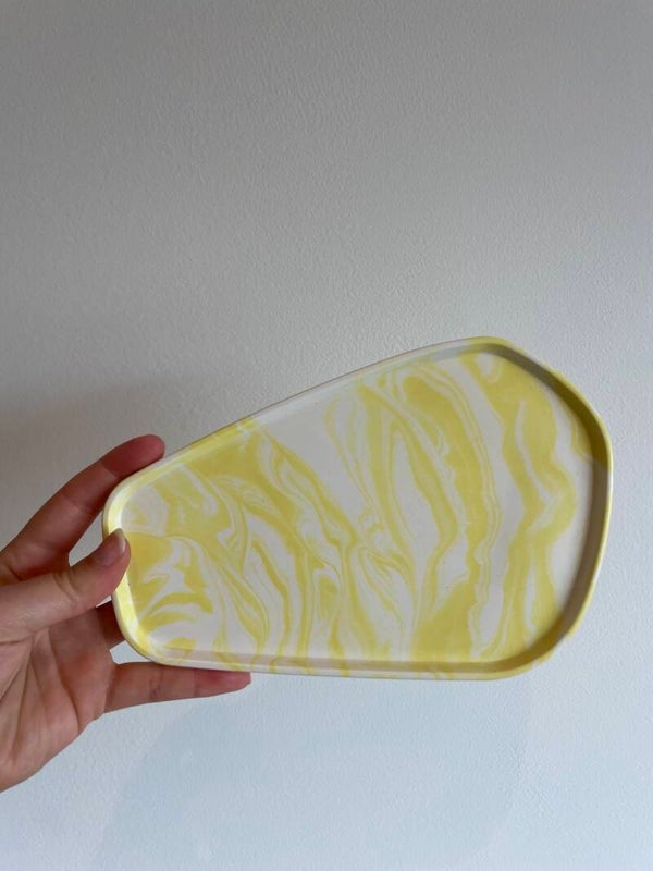 Schaal asymmetrisch rond L