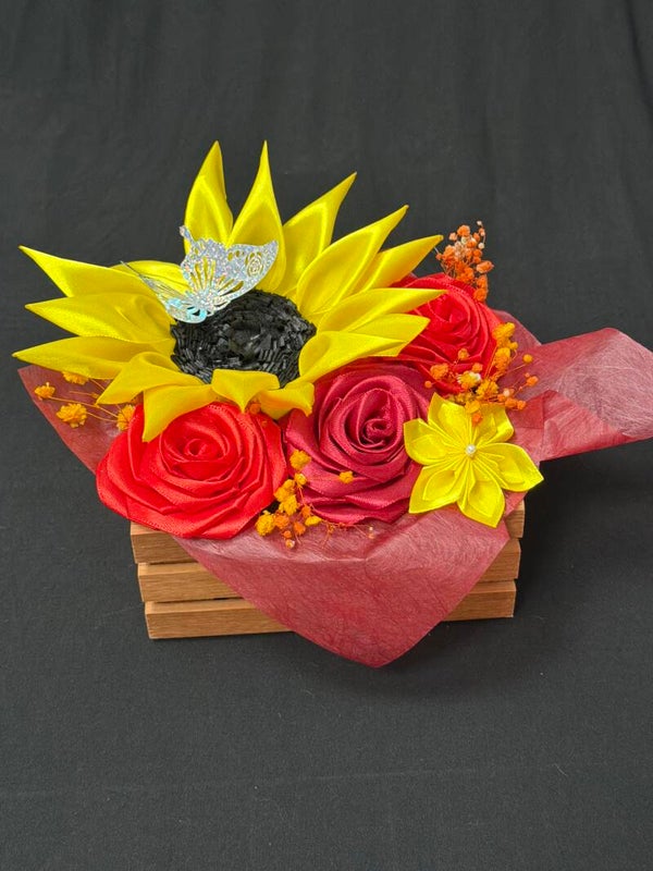 Composition en satin rose et tournesols lumineux