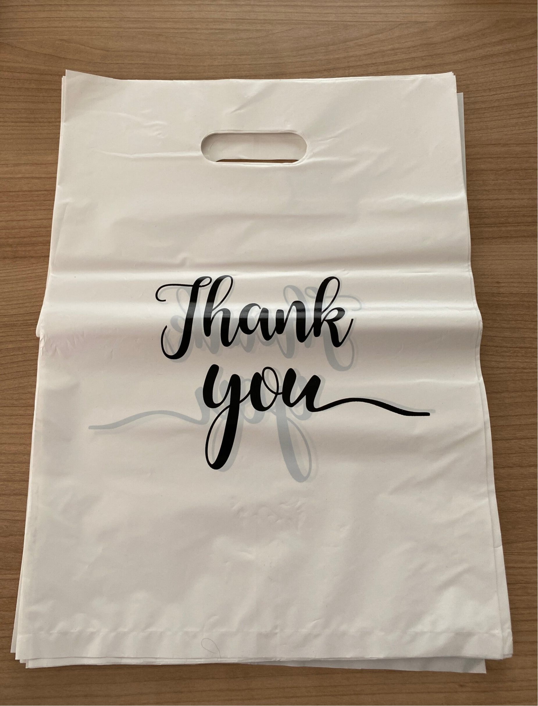 Grand sac plastique (pour le retrait sur place à Payerne)