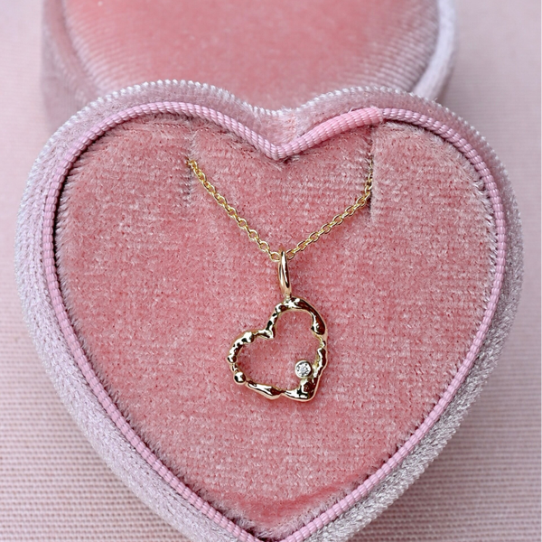 Gouden hartje met diamant