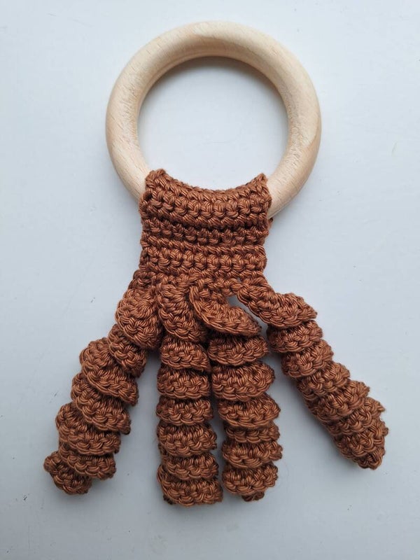 Bijtring octopus bruin