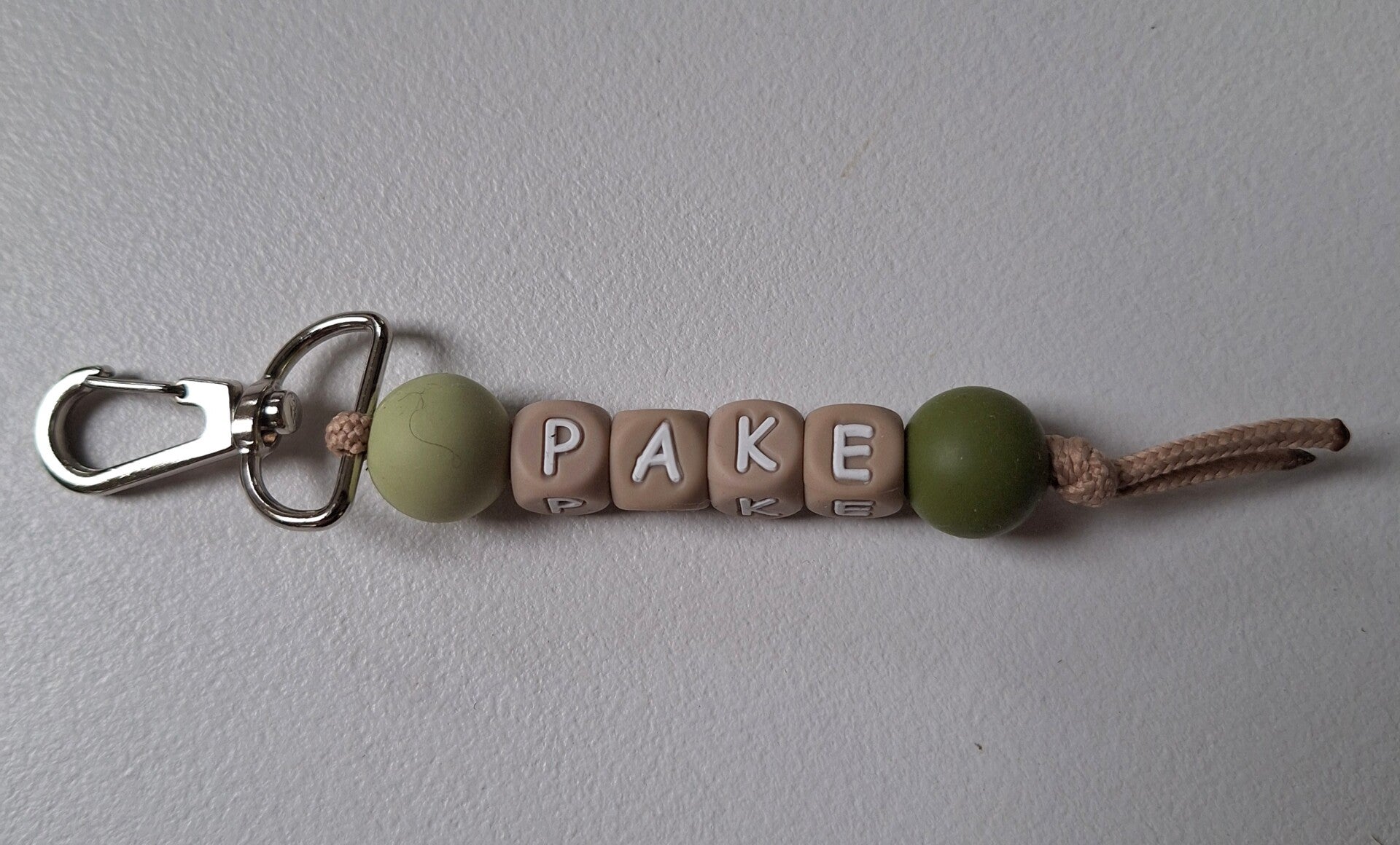 Sleutel/tas hanger pake