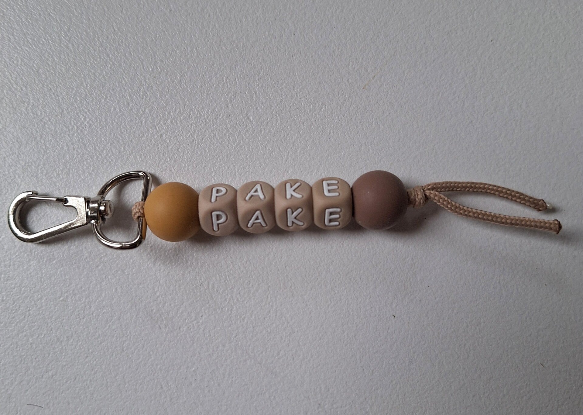 Sleutel/tas hanger pake