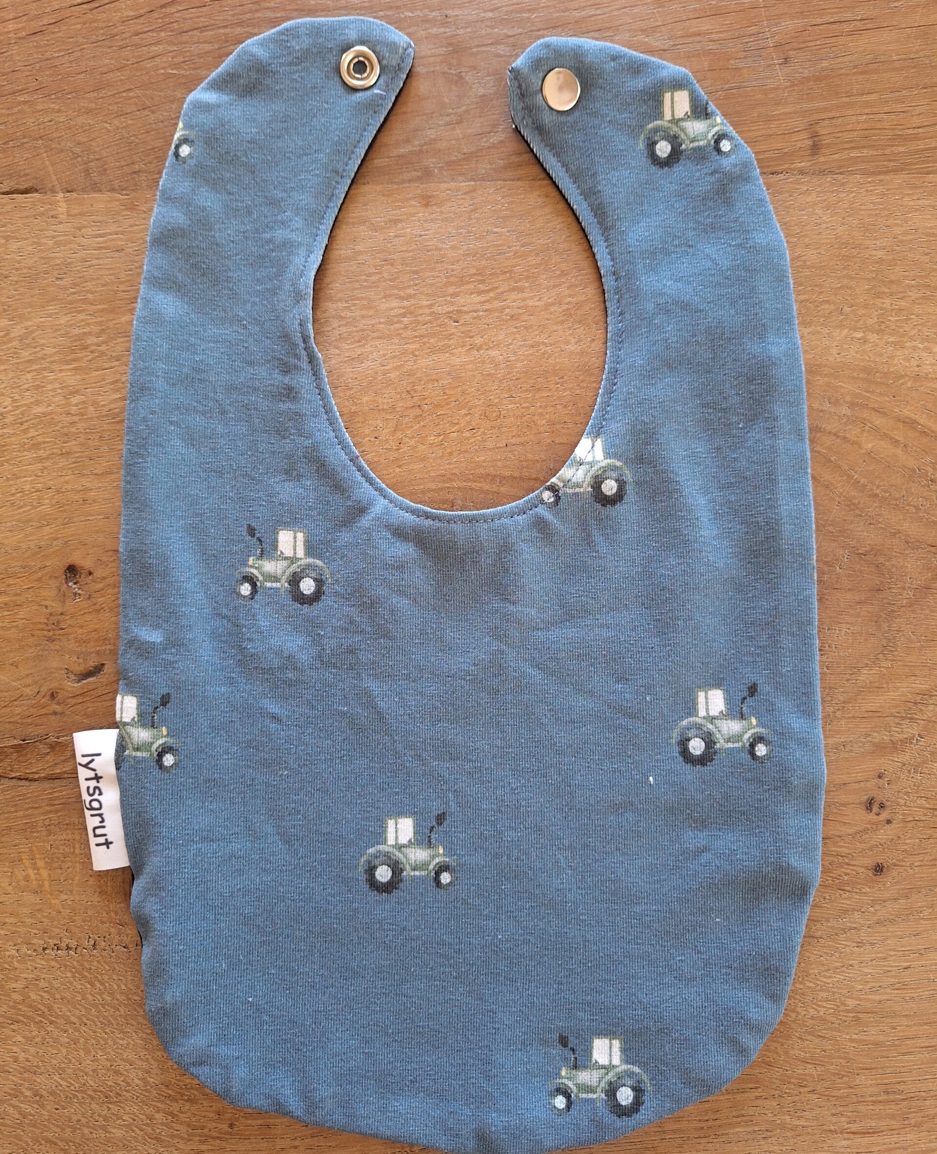 Babyslabbetje tractors indigo