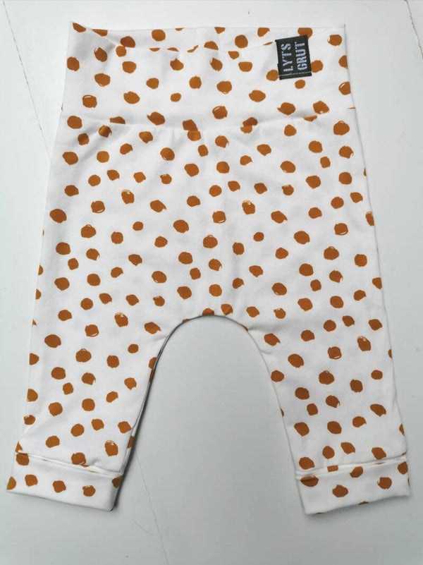 Broekje ecru/oker stip maat 62/68