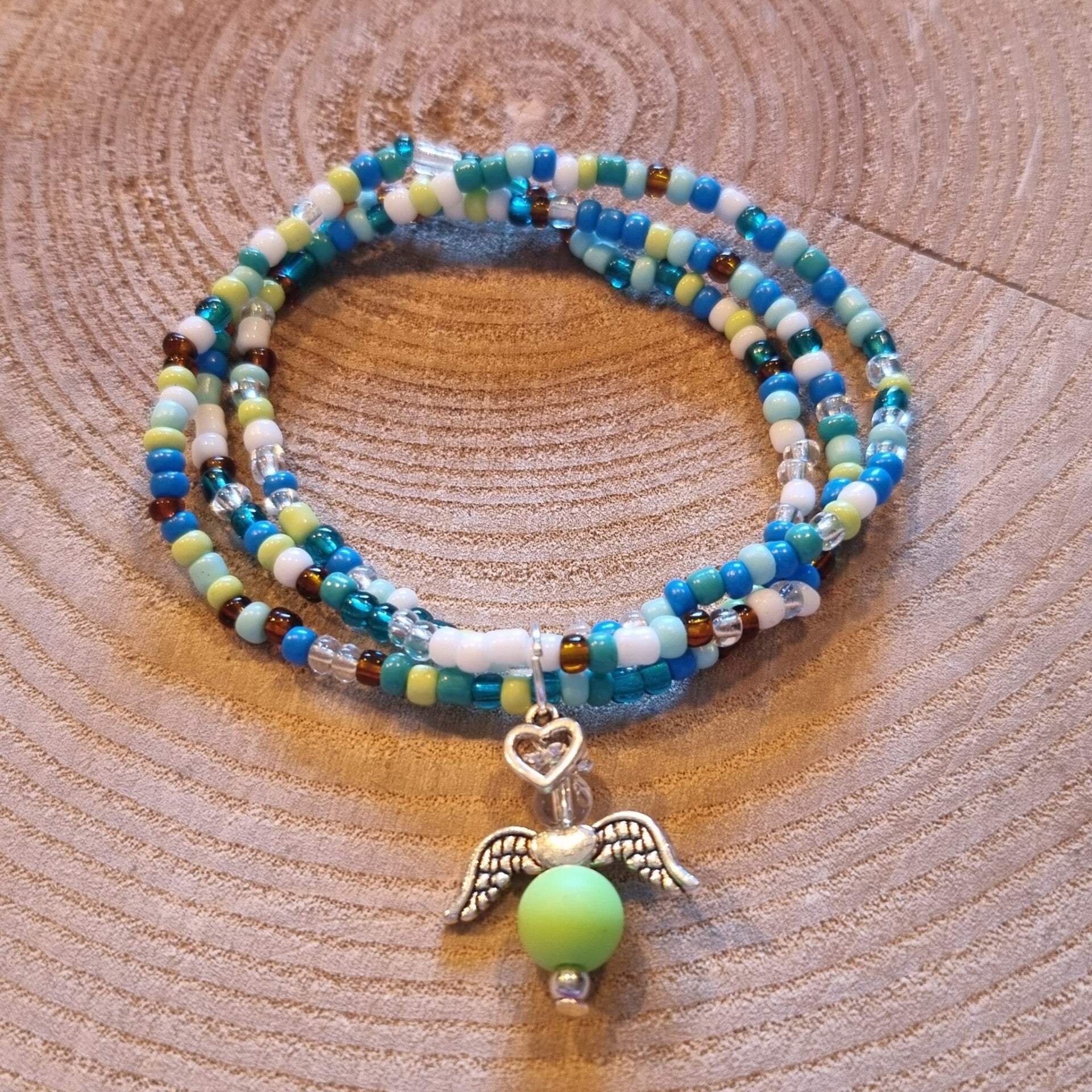 Geregen armband op elastiek groen blauw
