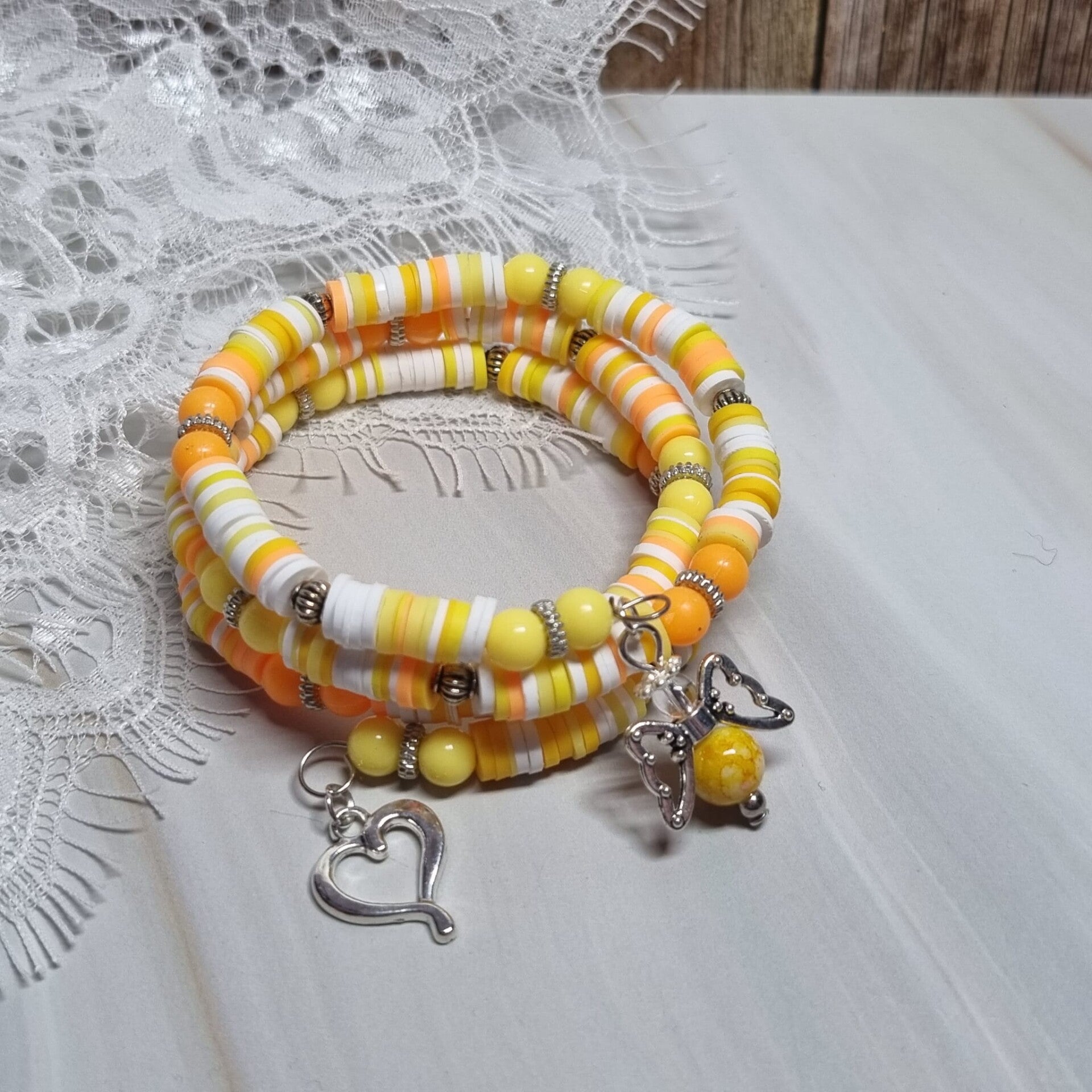 Wikkelarmband geel/oranje/wit