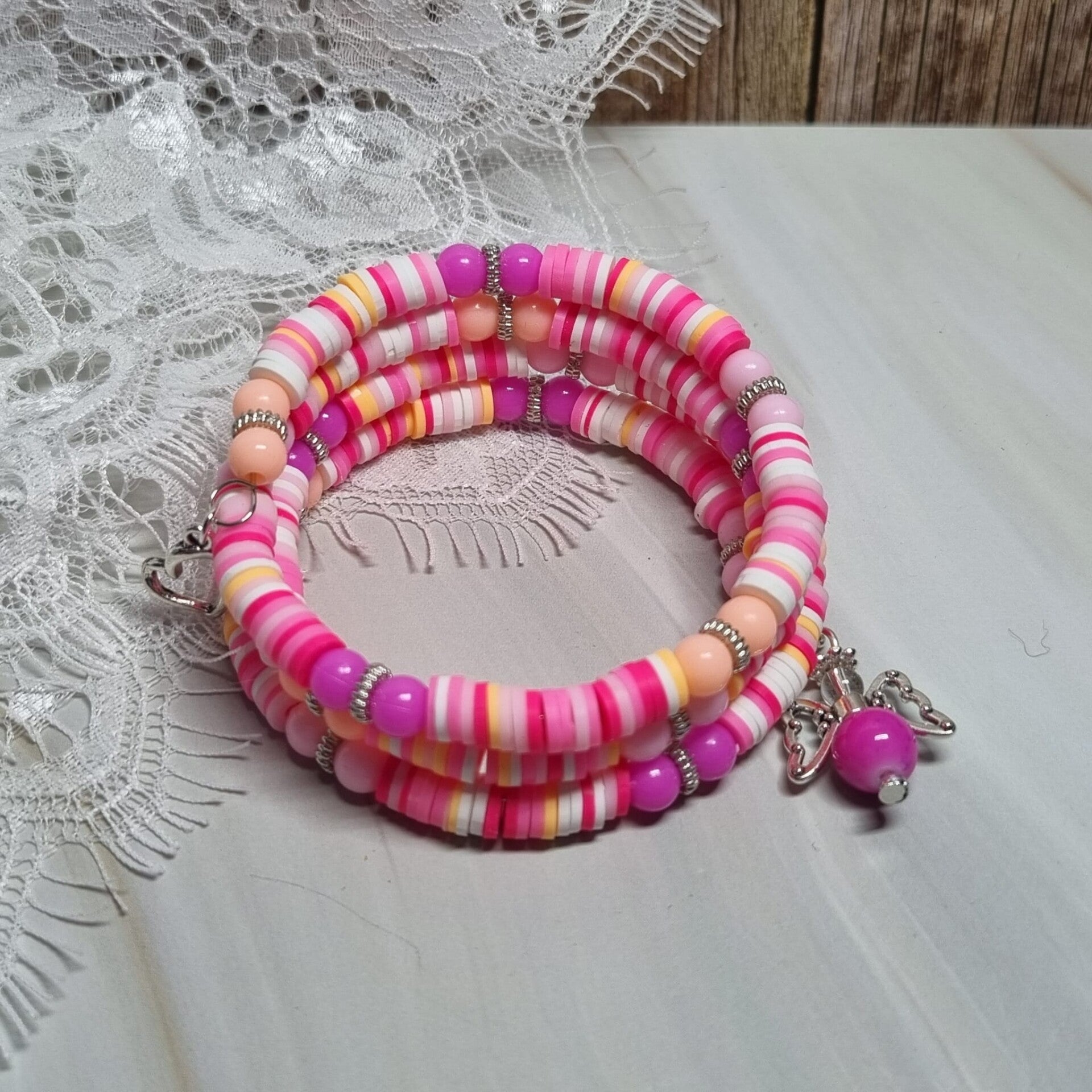 Wikkelarmband roze/wit