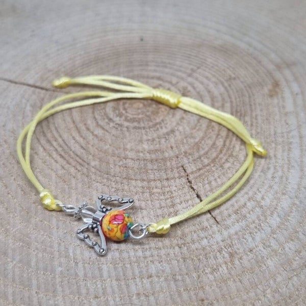 Satijnkoord armband licht geel