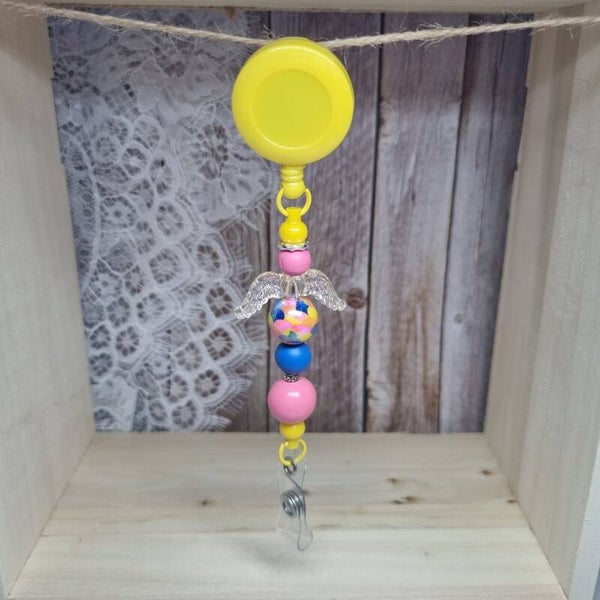 Badgehouder geel/roze/blauw