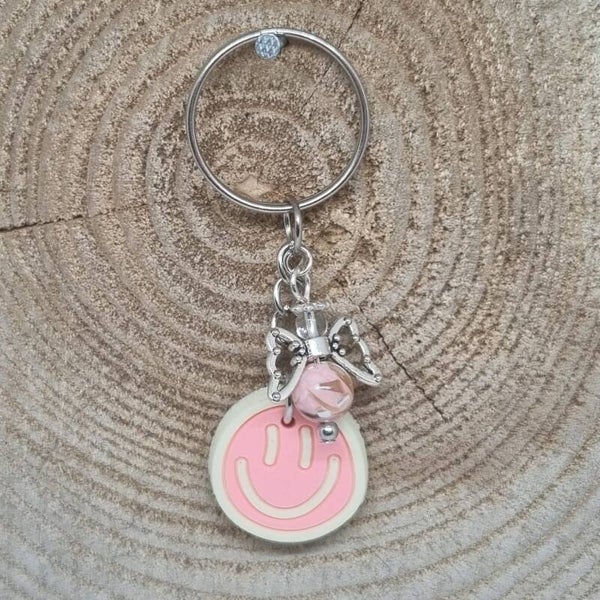 Sleutelhanger smilie roze/creme