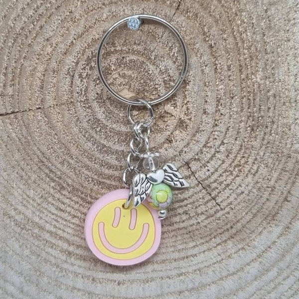 Sleutelhanger smilie roze/geel